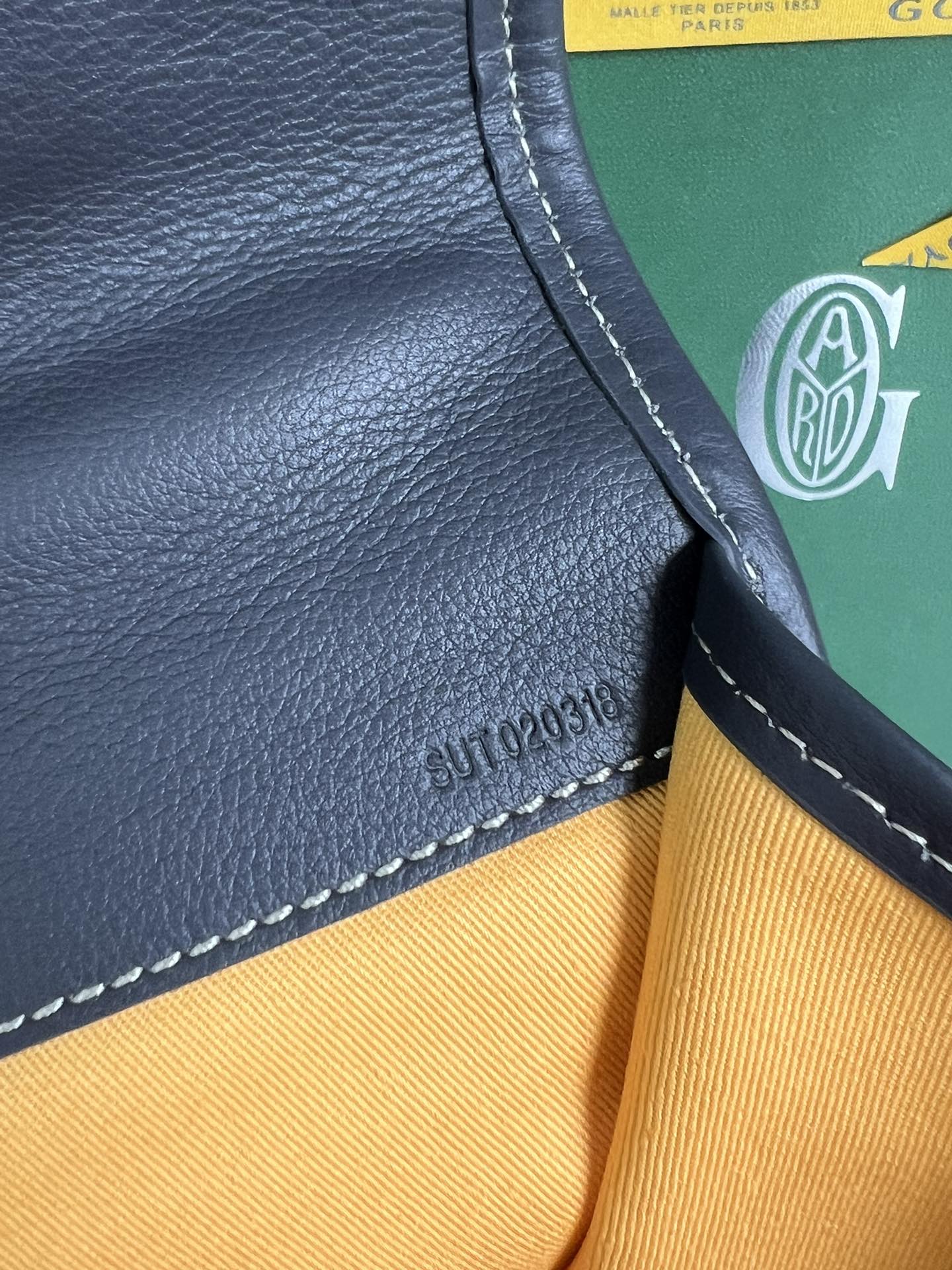 SAINT LÃ‰GER BACKPACK 35 IN BLACK GOYARDINE CANVAS AND CALFSKIN WITH CARTOON PATCH