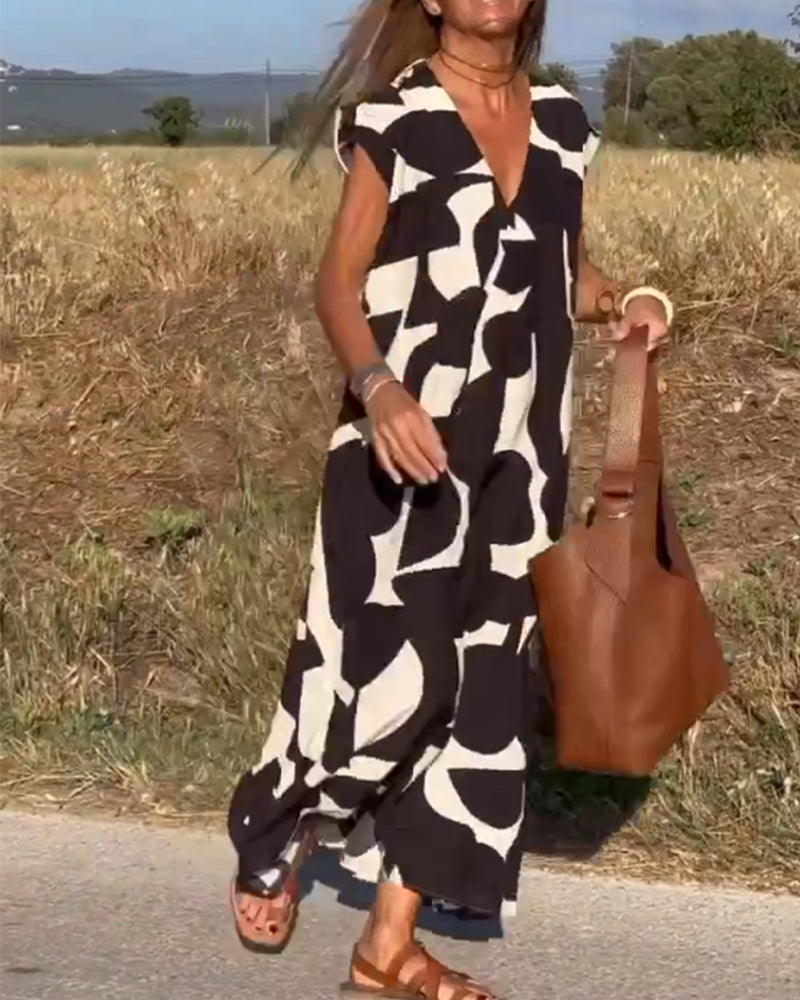 SITA - Dress with print and V-neckline