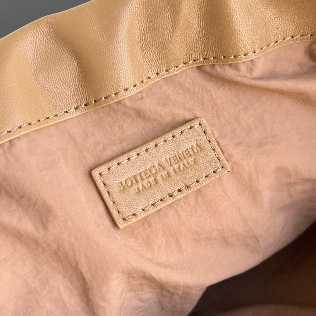 Bottega Veneta 2025 Dustbag Clutch Bag Pale Brown Calfskin