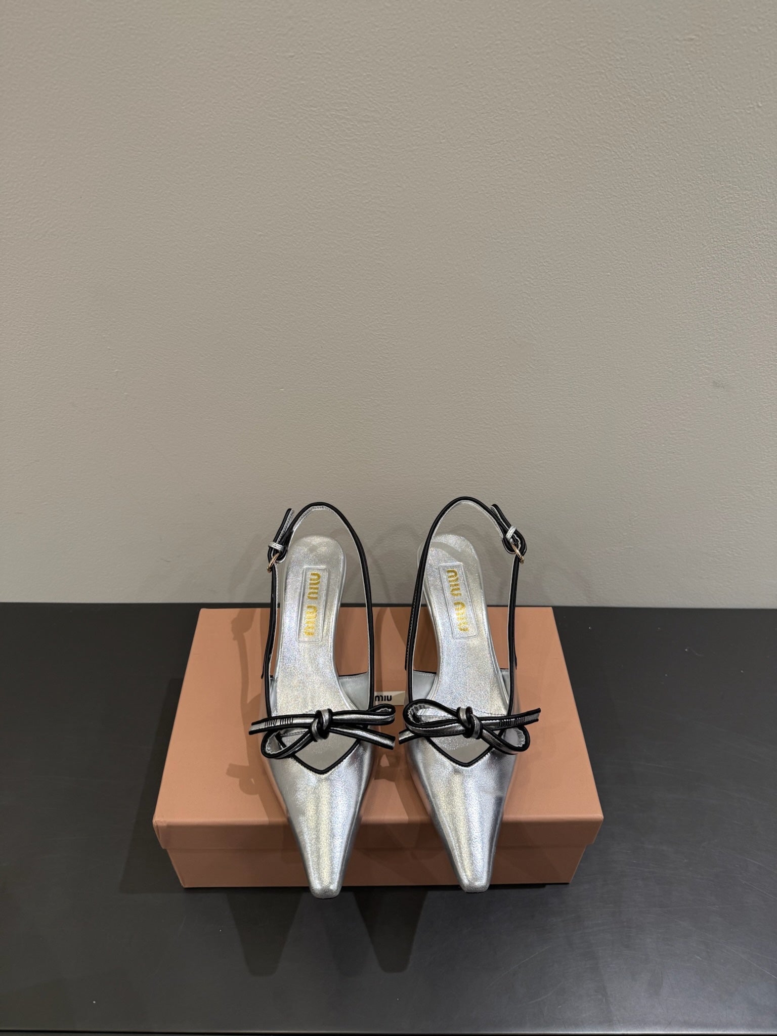 Miu slingback pump metallic sliver leather