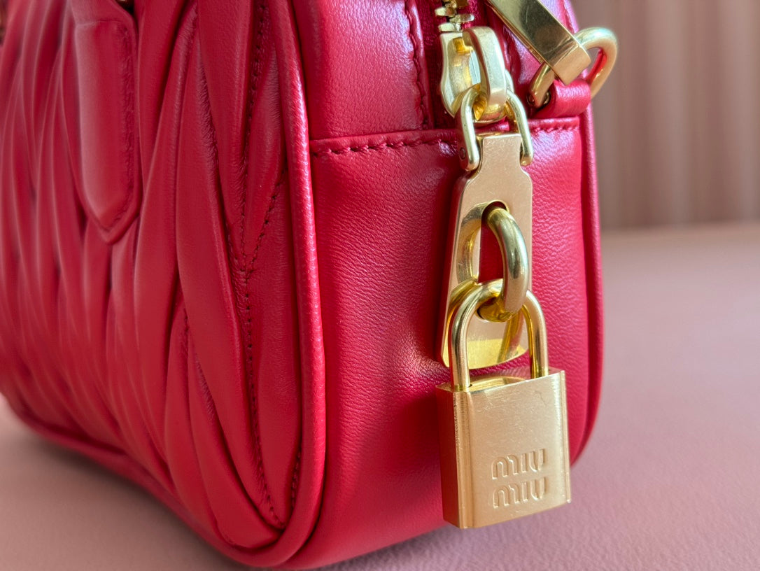 ARCADIE MATELASSÃ‰ BAG 19 IN CERISE RED CALFSKIN GOLD HARDWARE