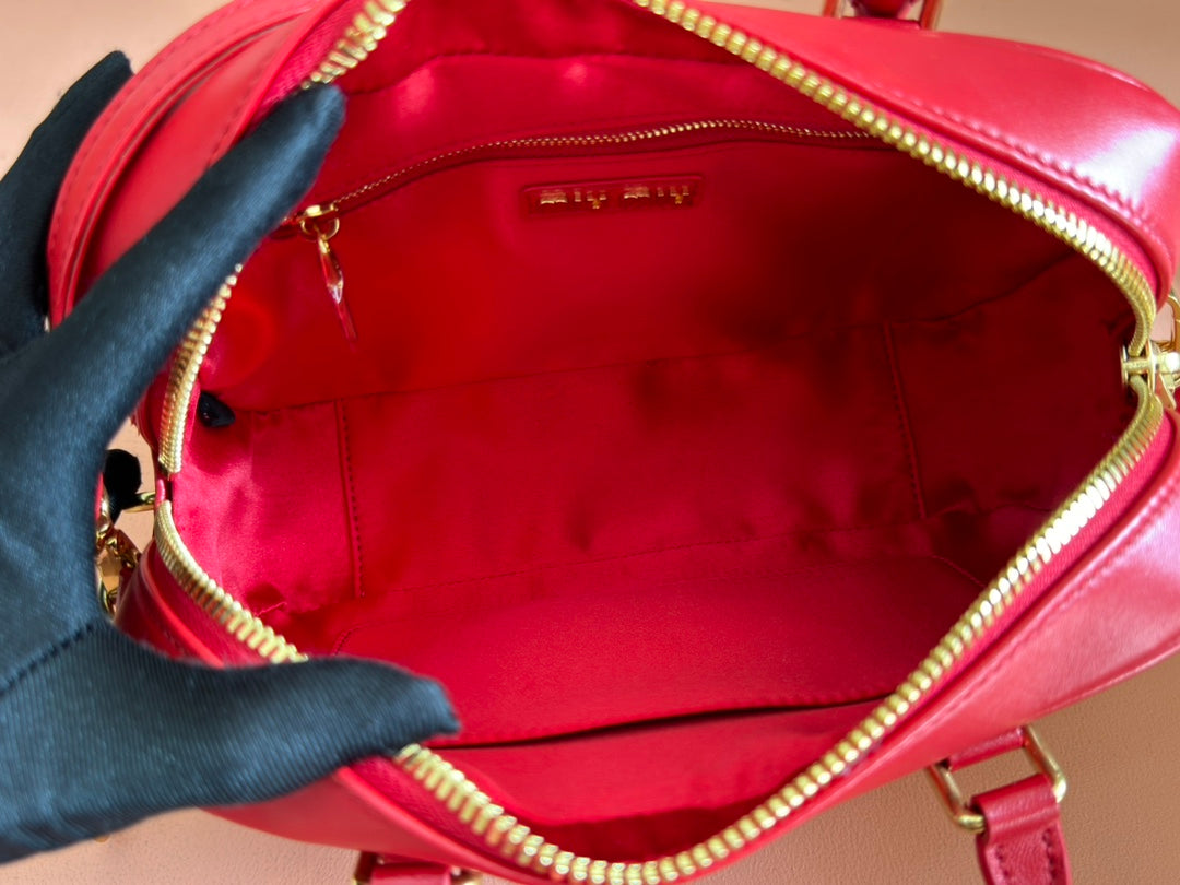 ARCADIE MATELASSÃ‰ BAG 24 IN CERISE RED CALFSKIN GOLD HARDWARE