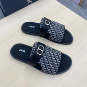 CD SYMBOL SLIDE CUT SANDAL BLACK AND WHITE JACQUARD